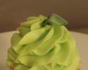 Take a bite of this delicious cupcake with green icing to finish it off!